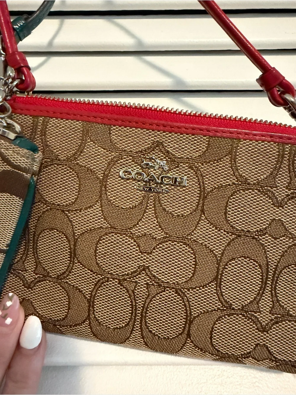 Coach two wristlets